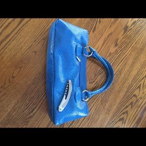 Wine purse with cork screw